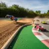 Off-road RC track with cars racing on diverse surfaces