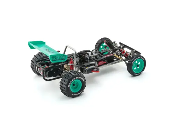 Kyosho Tomahawk '85 WC Worlds Spec — rear three-quarter view showing peppermint green '85 WC wing, knobbly rear tyres and exposed chassis